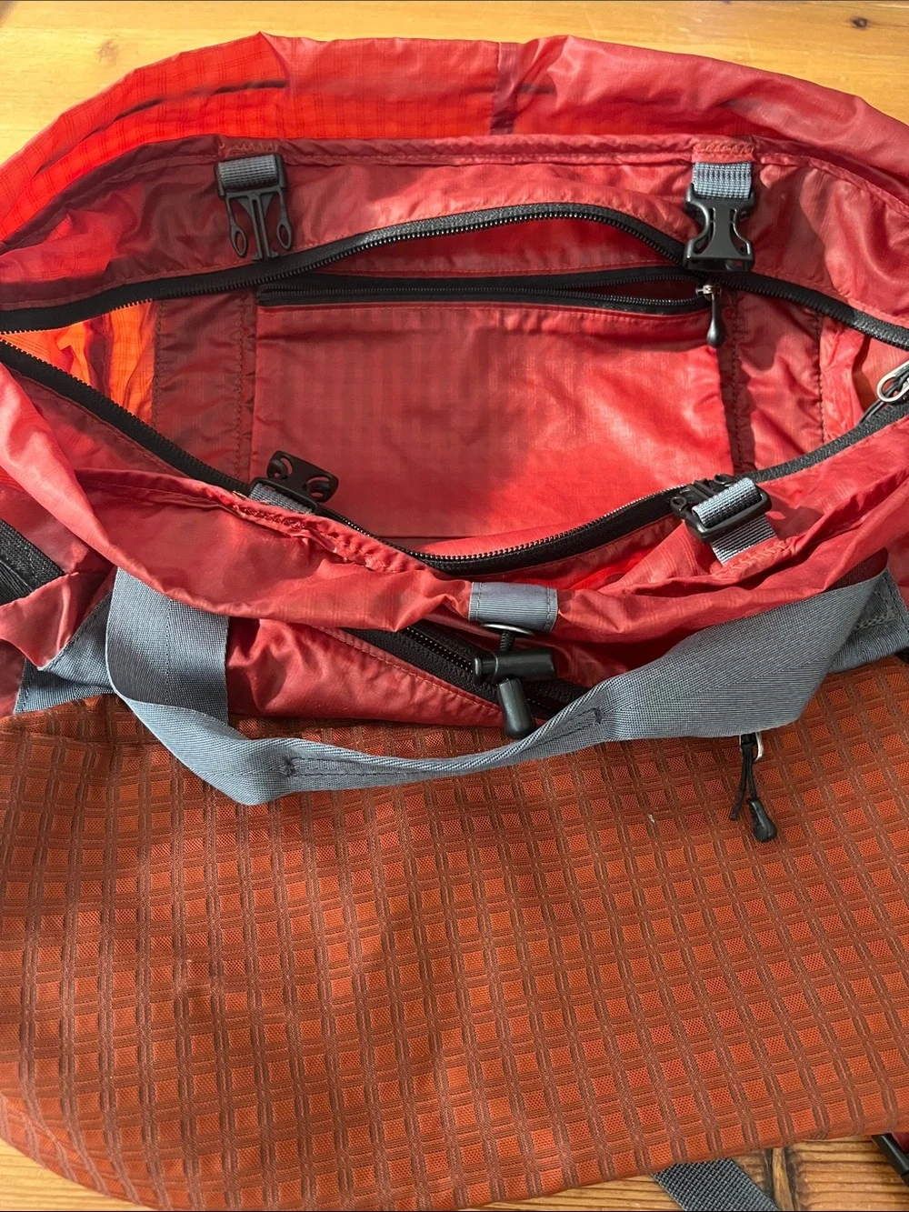 Classic Patagonia Red Tote with Gray Straps and Black Pockets